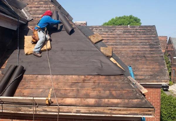 Understanding Warranties with Roofing Replacement Contractors